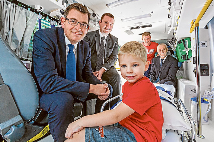 Fixer: Premier Daniel Andrews, left, pictured before last year’s state election, promised to improve ambulance response times after Labor won government. Picture: Gary Sissons