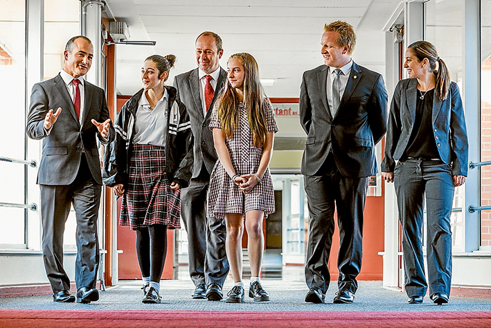 In the money: Education Minister James Merlino, left, student Caitlyn Barker, acting principal Stuart Jones, student Madeline Sellings, Frankston Labor MP Paul Edbrooke and assistant acting principal Skye Columbine tour Monterey Secondary College.  Pic: Gary Sissons