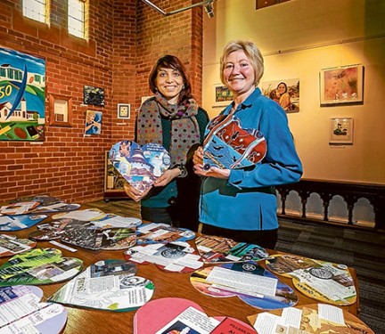 Come all ye faithful: Kingston Council communications development officer Timmah Ball, left, and The Venerable Jennie Savage prepare for last year’s Interfaith Network Art Exhibition. Picture: Gary Sissons