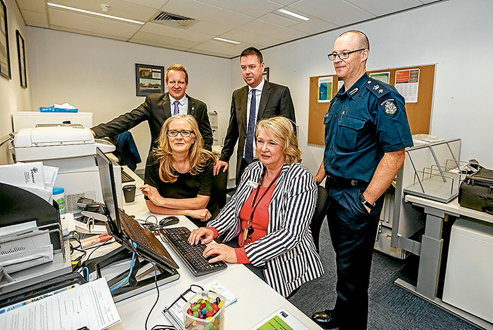 Crisis support: Frankston MP Paul Edbrooke, left, Windermere’s Dr Lynette Bouy, Police Minister Wade Noonan, Windemere team leader Pam Ruecker and Acting Superintendent Drew Morgan visited Frankston police station on Thursday to see how the support services move is helping crime victims. Picture: Yanni