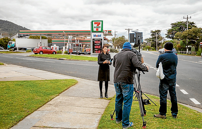 Newsmakers: Two violent armed robberies within 30 minutes were newsworthy enough to attract the attention of several television stations, including this crew from Channel 10. Picture: Yanni