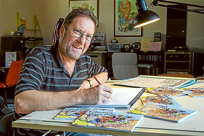 Man at work: Cartoonist Alan Rose hopes pigs can fly. Picture: Gary Sissons