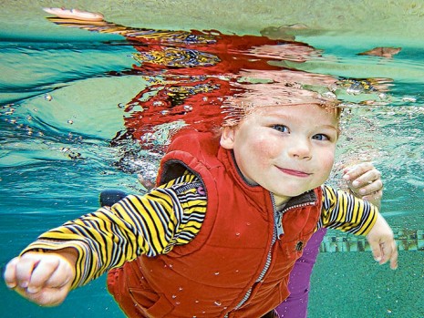 Water baby: NIK Monakhov, 2, enjoys the underwater view at a new program at Dingley Village aimed at teaching babies to swim. Photo: Gary Sissons