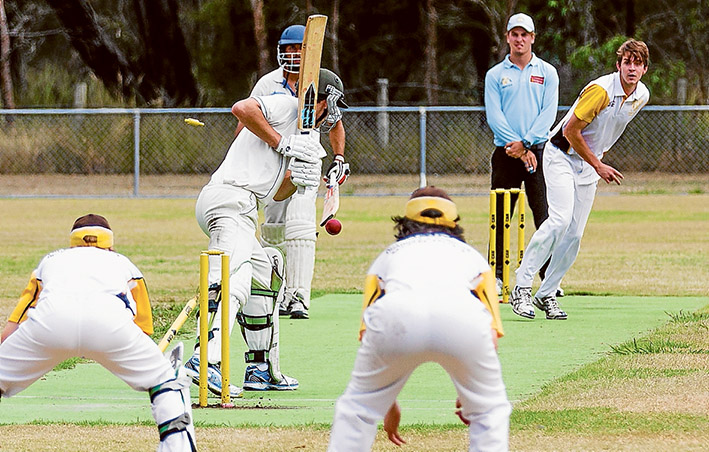 Gone: A wicket leaves the dirt as Hastings batsmen fall. YCW will go on to win the match. Picture: Andrew Hurst