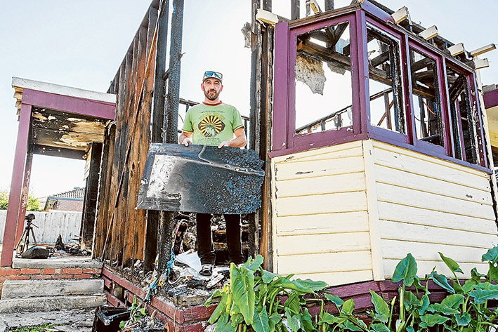 Remains of the day fire struck: Sam Bryant is grateful that the community rallied around when his Mordialloc home was gutted by fire. Picture: Gary Sissons