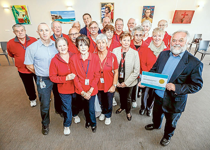 Helpers with heart: Peninsula Private Hospital’s cardiac rehabilitation and domiciliary program coordinator Jonathan Boothroyd with volunteers at an awards ceremony last week. Picture: Yanni