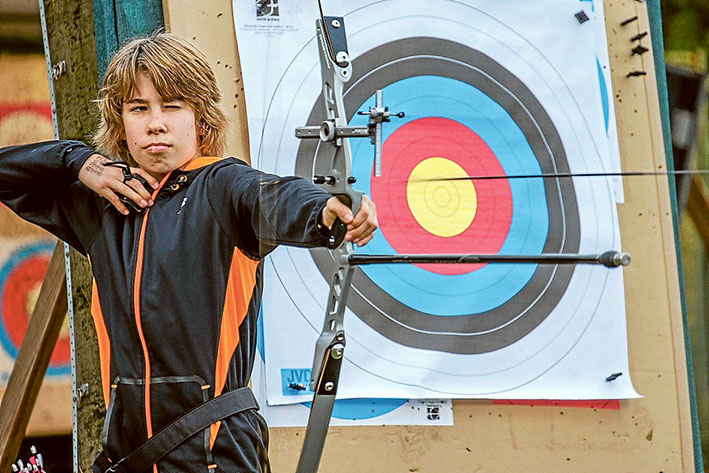 Eye on the bullseye: Jamie Burnett on target at the Frankston Archery Club in Baxter. Picture: Gary Sissons
