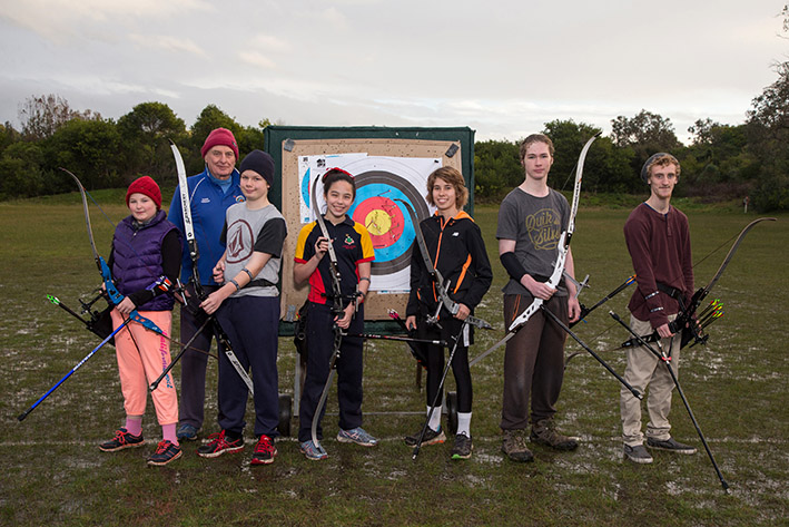 Frankston Archery Club. L-R Grace Mulheron, Hans Wright (Coach), Reuben Bower, Danielle Kent, Jamie Burnett, Harry Wooldridge and Samuel Ireland.
