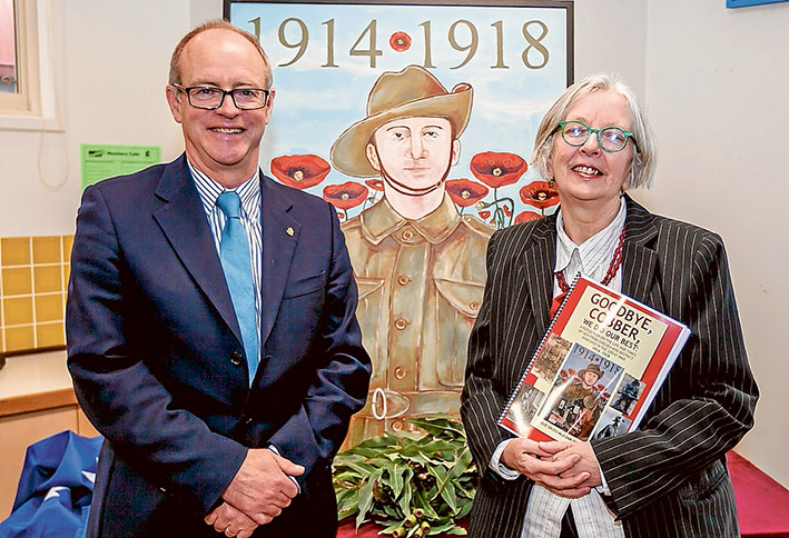 Lest we forget: State Secretary of ANZAC House Michael Annett with artist and author Julia Gross McAdam at the official launch of a book dedicated to the lives of Chelsea district men who answered the call to go to war during World War I. Picture: Yanni