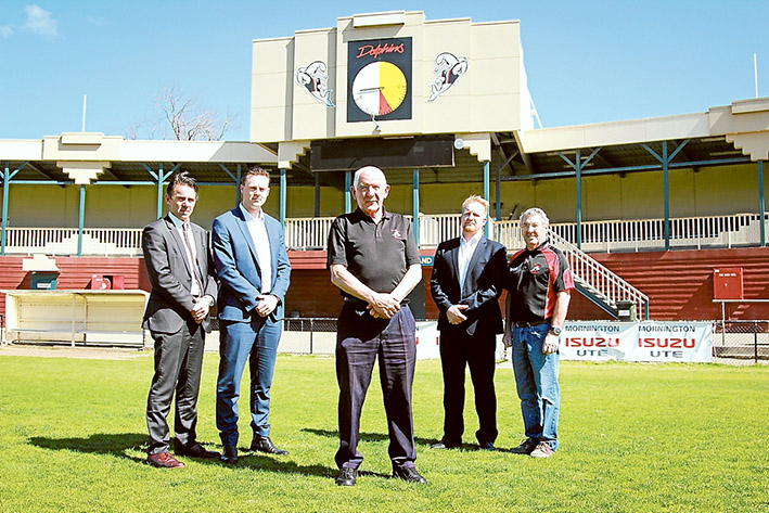 TIME is ticking away and no one is more aware of the dangers threatening the very existence of Frankston Football Club than stalwart Bryan Mace (centre), with the mayor, Cr James Dooley, Liberal Dunkley MP Chris Crewther, Labor Frankston MP for Frankston Paul Edbrooke, and former board member John Davis. They formed a team at the Dolphins ground on Wednesday. “Putting politics aside, we’ve joined together to urgently call on AFL Victoria to retain the VFL licence for Frankston Dolphins,” Mr Crewther said. “By working altogether, we will advocate for a positive solution to be found to keep the club going. This is important not only for the club, but for aspiring footballers across Frankston and the peninsula who aim to get to VFL or AFL level, the community and creditors, who include many local small businesses who would benefit far more by having the club continue.” Picture: Cameron McCullough