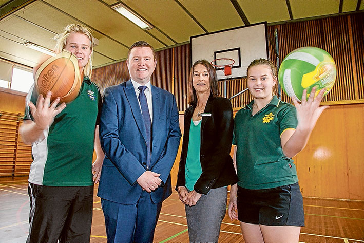 Courting cash: Sam Trewavas, left. Mordialloc MP Tim Richardson, Mordialloc College principal Michelle Roberts and Kayla Strode celebrate funding for new sporting facilities. Picture: Gary Sissons