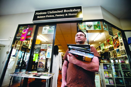 Budget blues: Chelsea bookshop owner Chuck McKenzie has noticed a drop in takings since the federal budget. Picture: Yanni