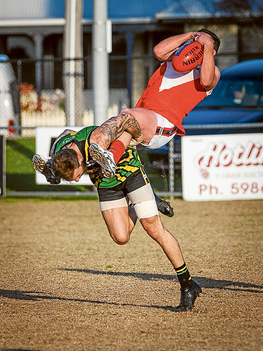 Speccy-tacular: Red Hill went down to Dromana in Sunday’s Nepean League game despite this marvellous mark. Final score Dromana 9.15 (69) to Red Hill 7.6 (48). Pictures: Andrew Hurst