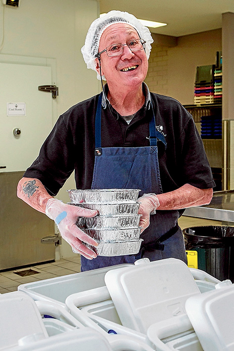 Special delivery service: Robert Orr packing the meals ready for Meals on Wheels clients.  Picture: Gary Sissons