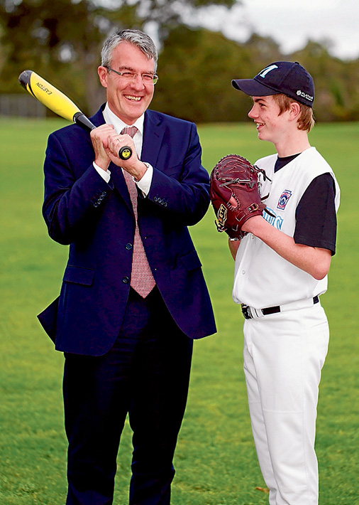 Pitching in: MP Mark Dreyfus with baseballer Shelby Roberts. Pic: Yanni