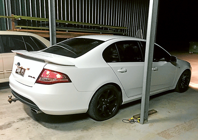 Car hunt: The stolen white 2008 XR6 Ford hijacked by gang members at gunpoint in Frankston South. Police are appealing for help in tracking it down. The original registration number is SAM95.