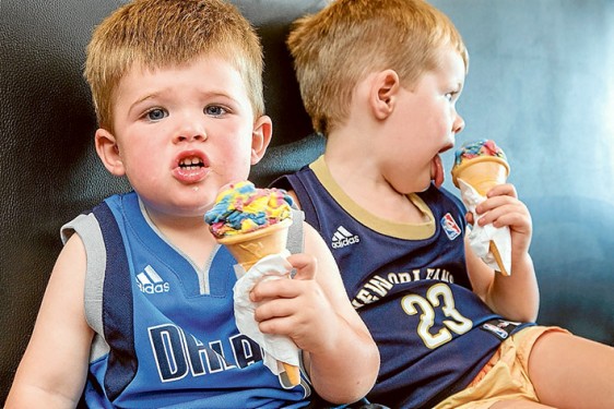 Got it licked: Ged Head customers Harry and Will enjoy ice cream cones. Picture: Gary Sissons