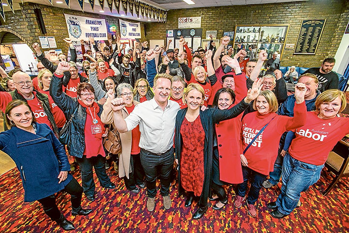 The swing is in: Labor supporters including Peta Murphy, front centre, and Labor state MPs Paul Edbrooke and Sonya Kilkenny all smiles at an election night party event at Pines Football Club. Picture: Gary Sissons