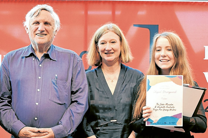 Literary tales: Writing comes naturally to Frankston writer Abigail Strangward, right, pictured with author John Marsden and Hatchette Australia publishing director Fiona Hazard at the Melbourne Writers Festival. Picture: Majella Frick