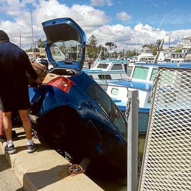 Close call: Emergency services rescued two women after a car accidentally tipped off Mordialloc Pier.