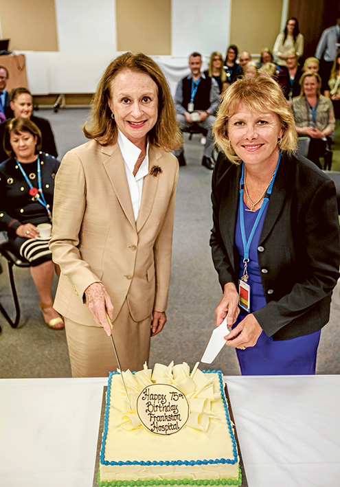 Slice of history: Peninsula Health board chair Nancy Hogan, left, and CEO Sue Williams cut the cake to celebrate Frankston Hospital’s 75th anniversary. Picture: Yanni