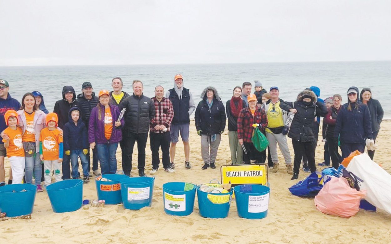 VOLUNTEERS team up to clean the beach last week. Picture: Supplied