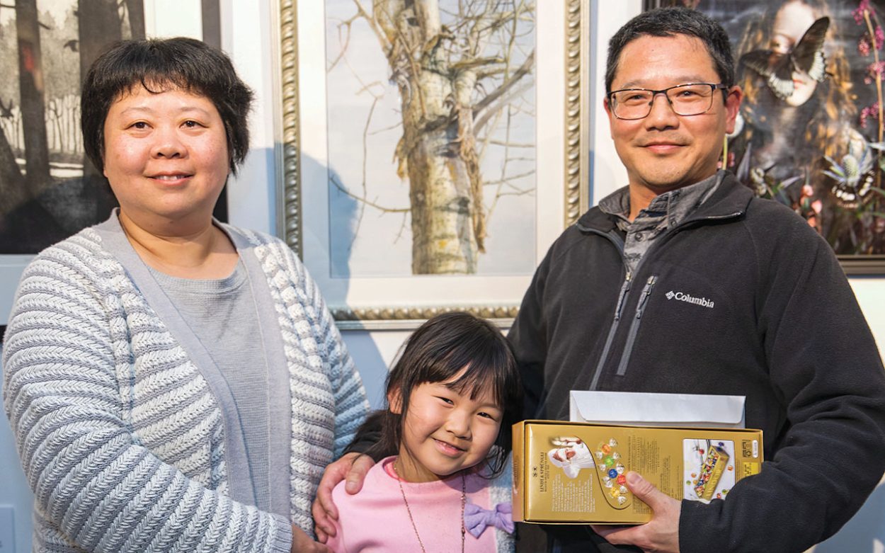 ARTIST Hongli Li and his family at the Frankston Arts Centre. Picture: Supplied