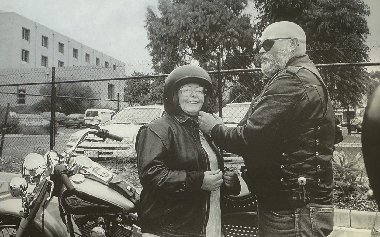 A PINK Lady prepares for a ride on a Harley Davidson during a hospital fete. Picture: Supplied