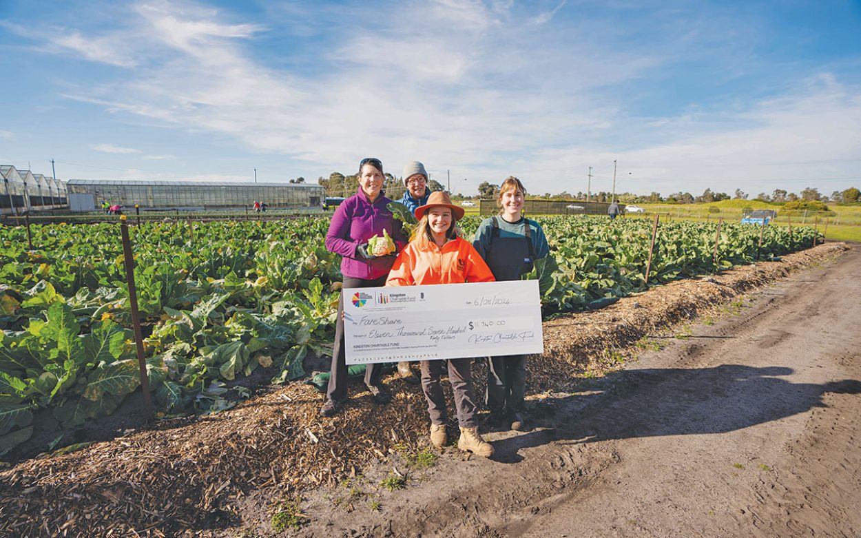 FARESHARE accepting a grant from the Kingston Charitable Fund last year. Picture: Supplied